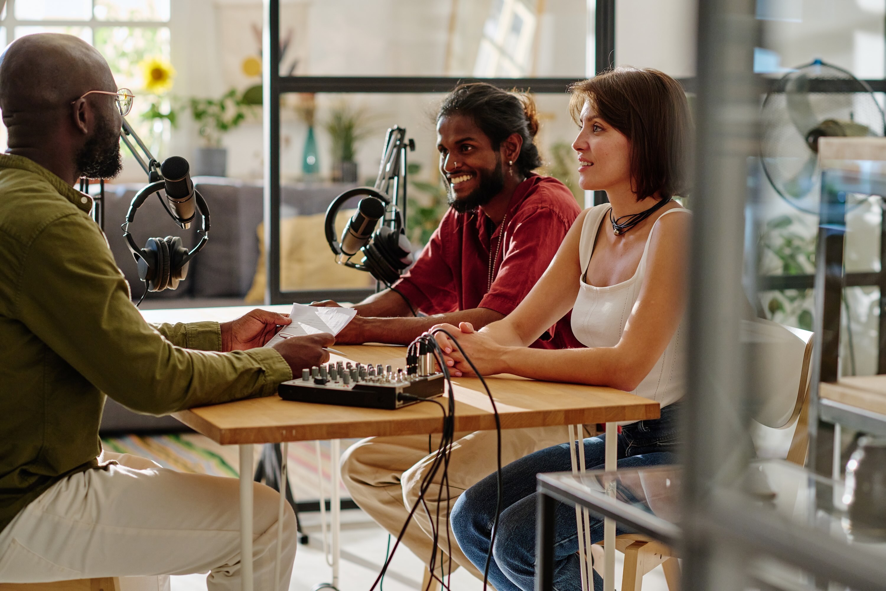 Group of people chatting on podcast