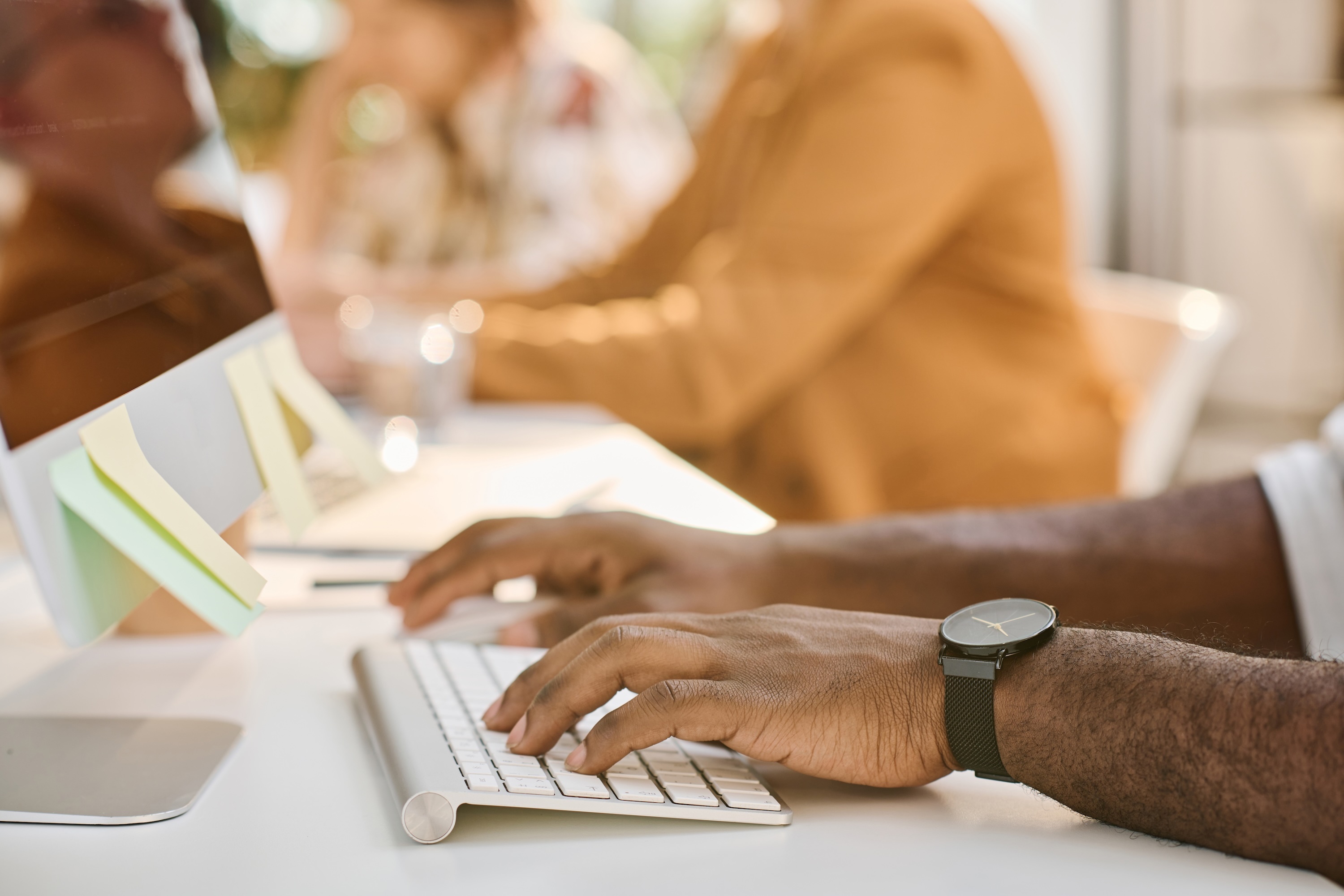 Fingers typing on computer keyboard